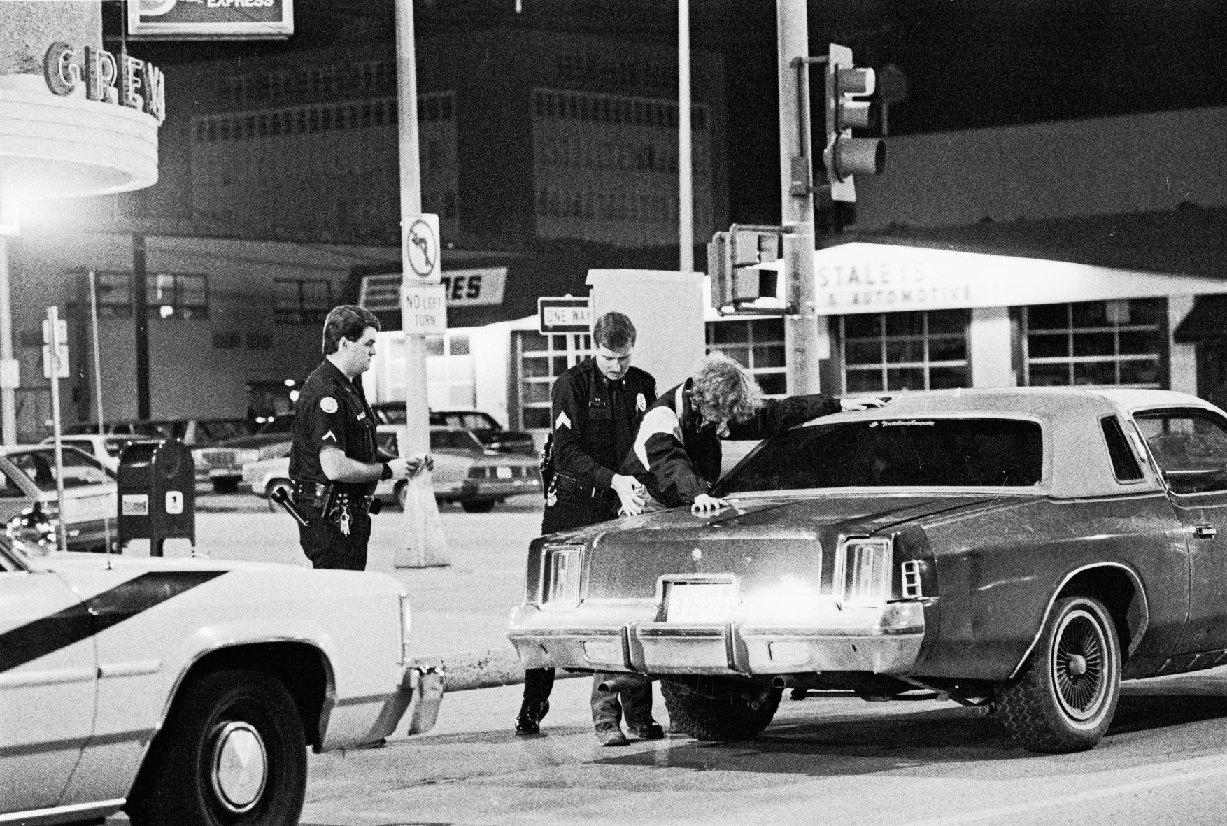 Billings police making prostitution arrest, 1990